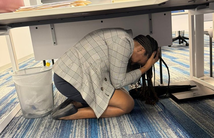 A Ministry of Financial Services staff member participating in the October 16 ShakeOut exercise