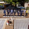 Group Photo of Officials Facing Long Look Social Home Complex