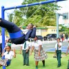 Hon de Castro and Students on Swings