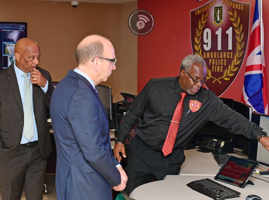 Director of 911 Russel Jones, Honourable Wheatley and Governor Pruce